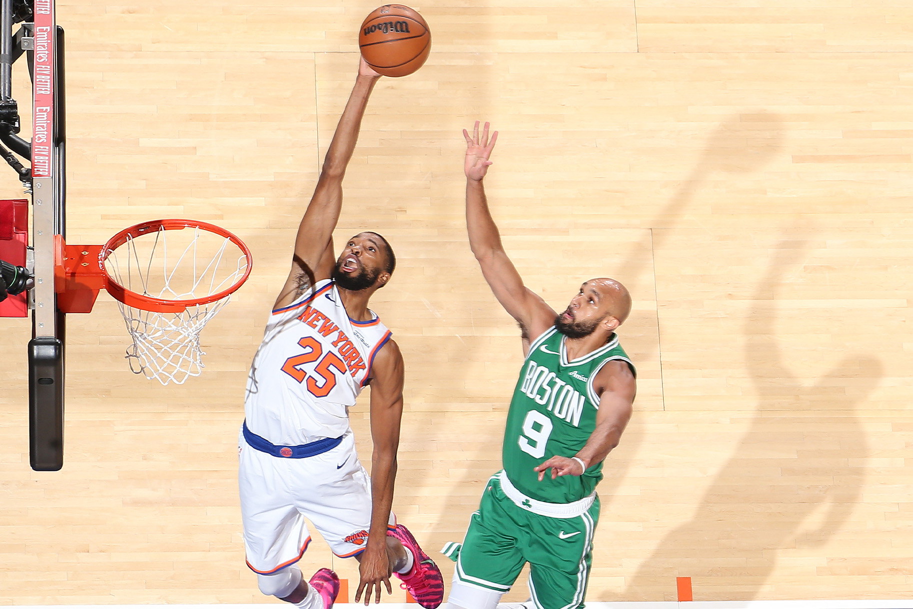 Mikal Bridges #25 of the New York Knicks drives to the basket,