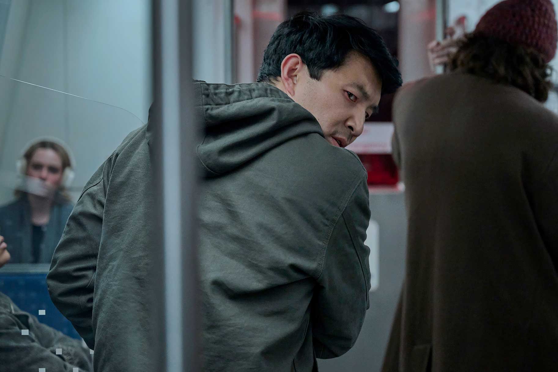 Alexander looking behind his shoulder in The Copenhagen Test Season 1 Episode 8.