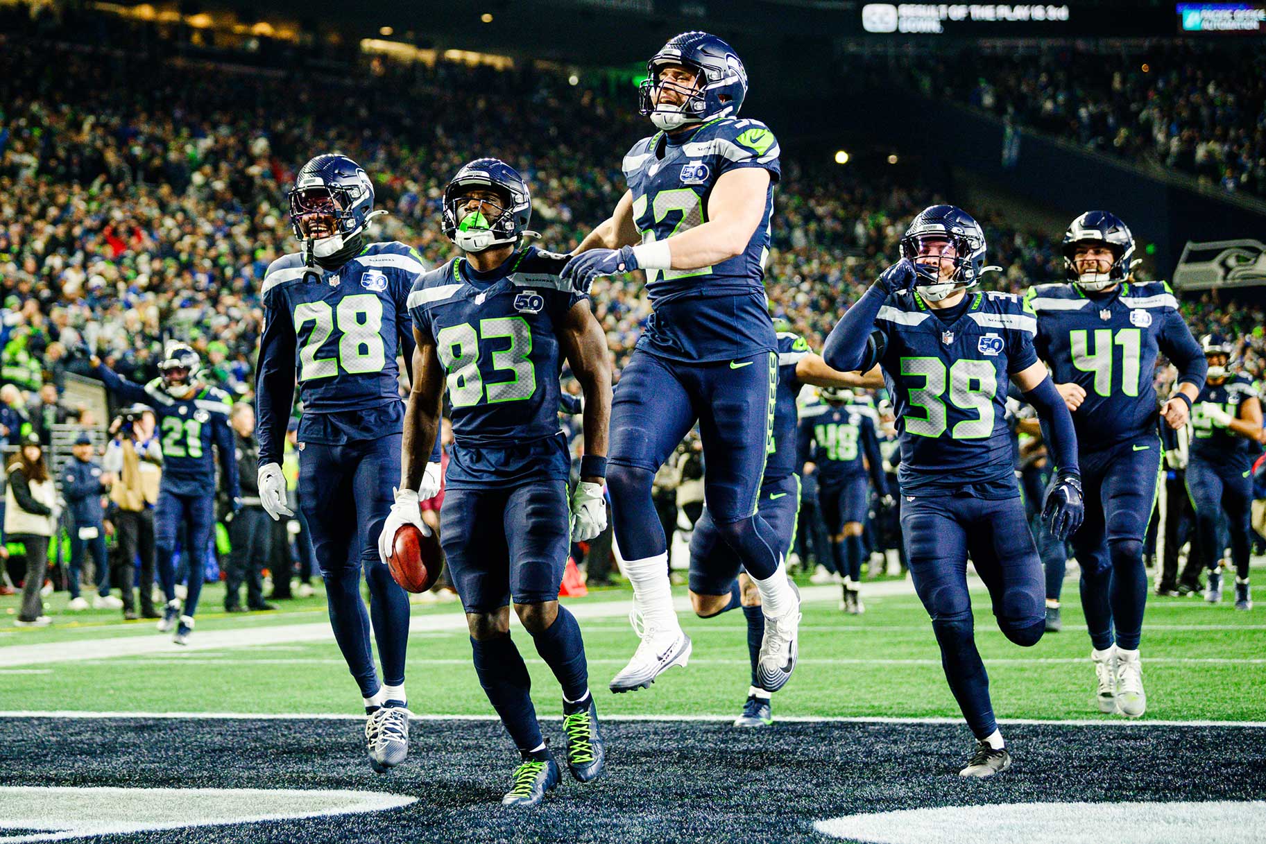 Dareke Young of the Seattle Seahawks celebrates with teammates after recovering a muffed punt during the third quarter of the NFC Championship game.