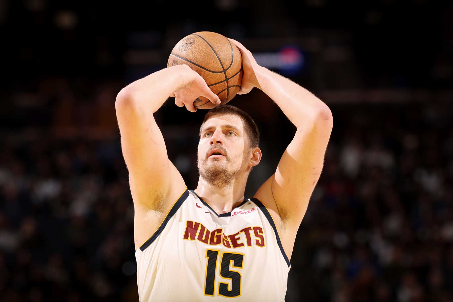 Nikola Jokic of the Denver Nuggets shoots a free throw during the game against the Golden State Warriors.