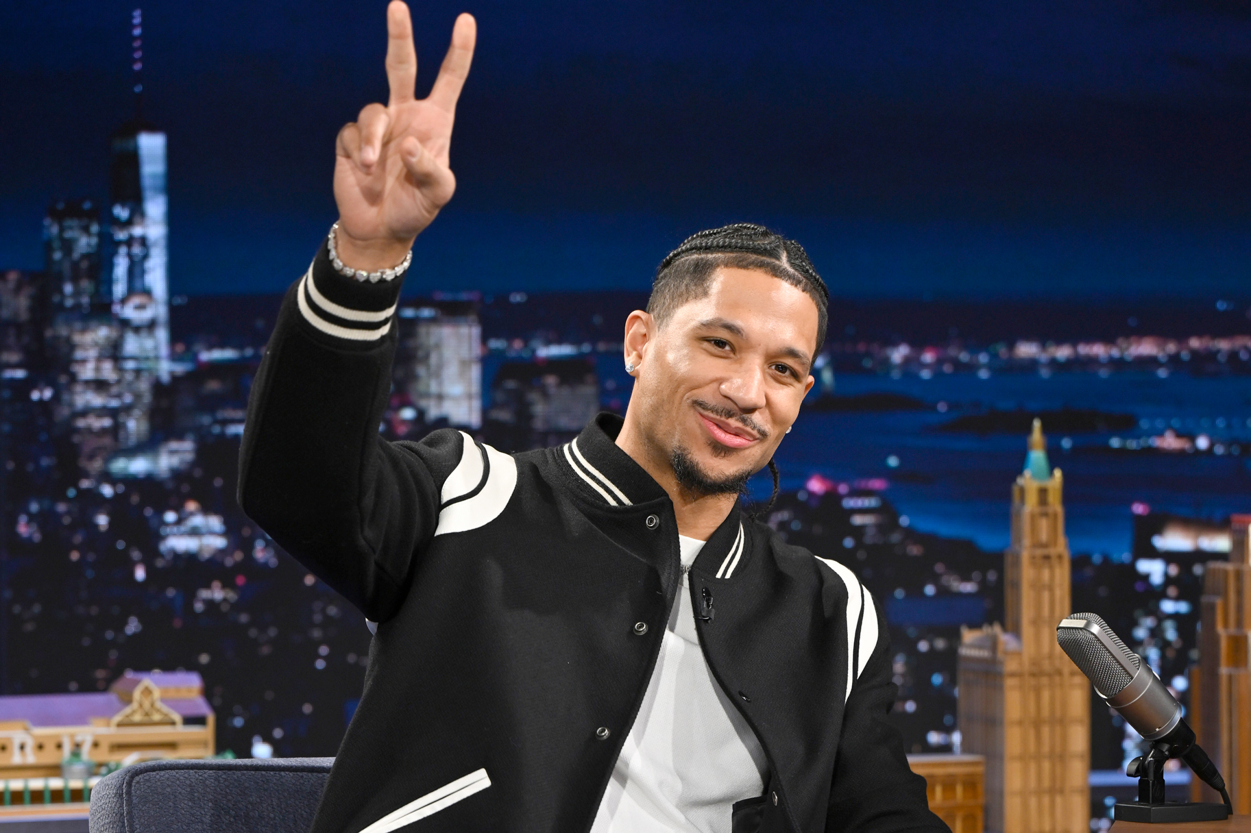 Josh Hart throws up a peace sign during The Tonight Show Starring Jimmy Fallon.
