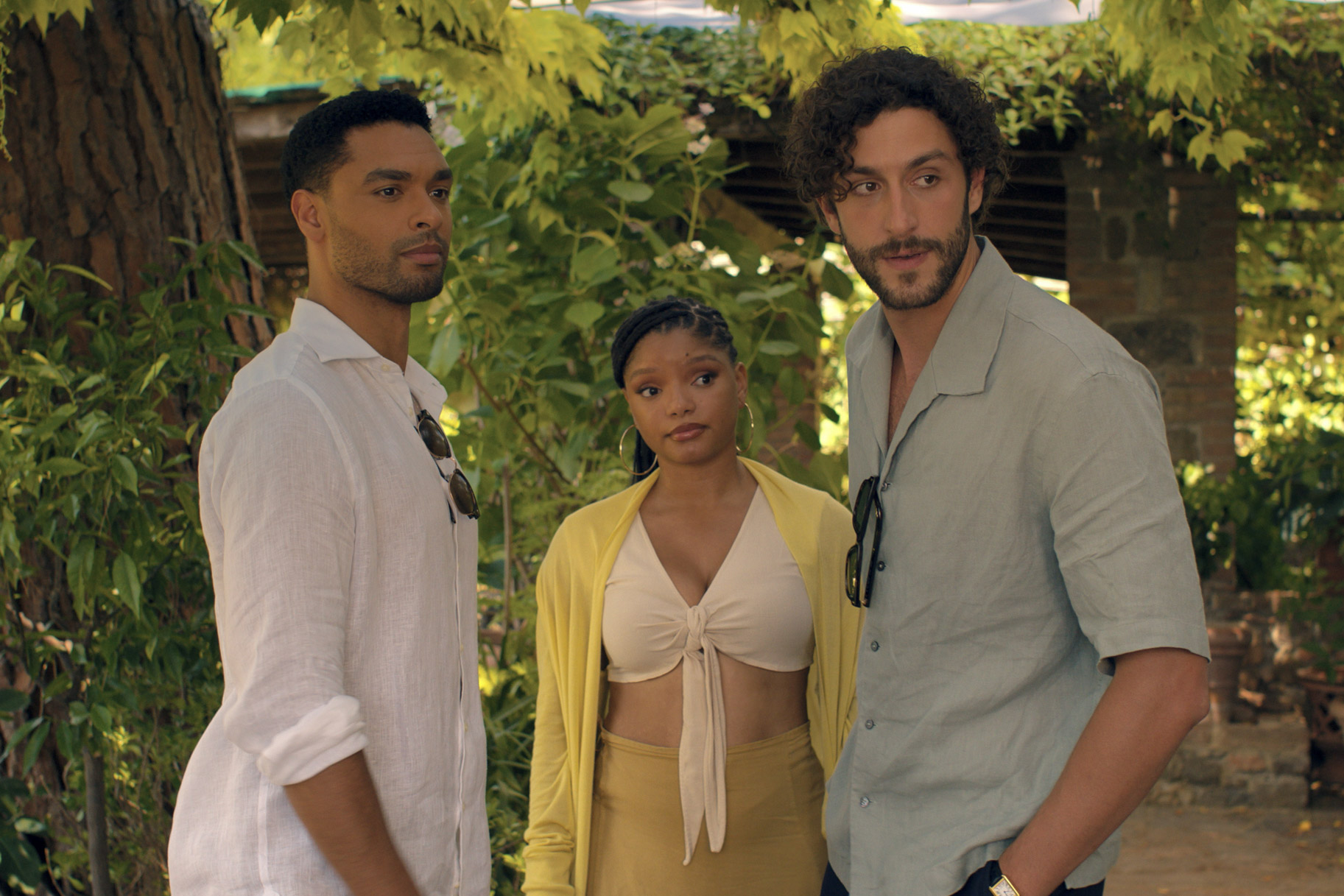 Michael (Regé-Jean Page), Anna (Halle Bailey) and Matteo (Lorenzo de Moor) look onward together in You, Me & Tuscany (2026).
