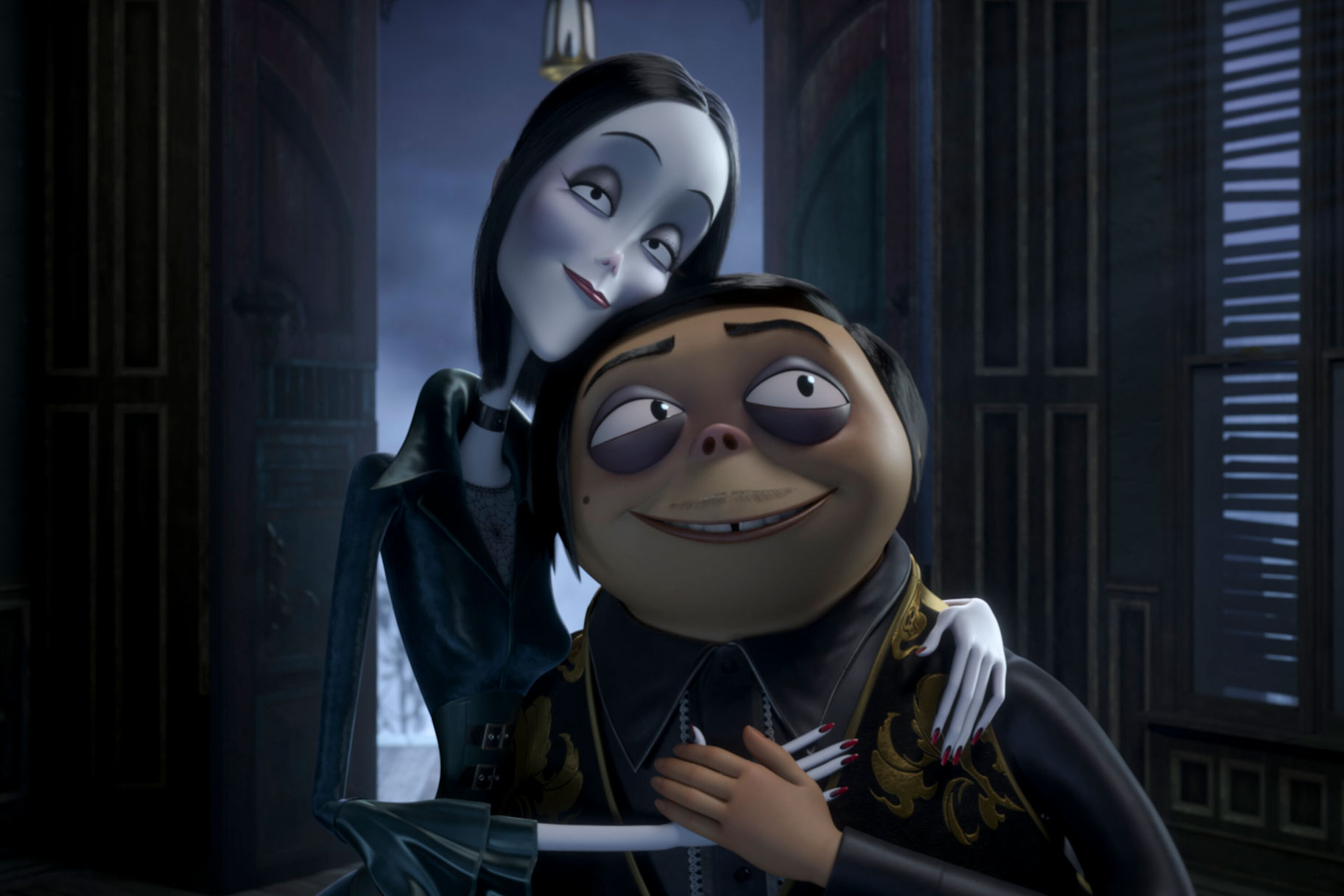Gomez and Morticia Adams embracing in front of an open window during The Addams Family (2019).