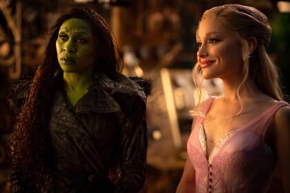 Elphaba (Cynthia Erivo) and Glinda (Ariana Grande)&nbsp;stand next to each other in Wicked For Good (2025).