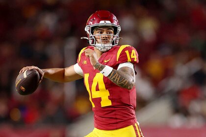 Jayden Maiava of the USC Trojans throws a pass against the Michigan State Spartans.