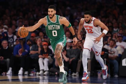 Jayson Tatum of the Boston Celtics dribbles against the New York Knicks.