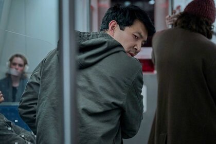 Alexander looking behind his shoulder in The Copenhagen Test Season 1 Episode 8.