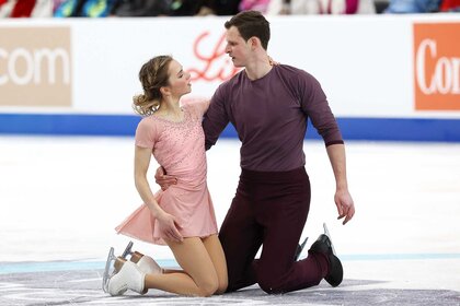 Alisa Efimova and partner, Misha Mitrofanov, positioned for competition in the Championship Pairs Free Skating during the 2026 United States Figure Skating Championships.