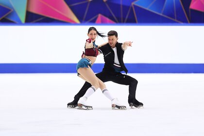 Charlene Guignard and Marco Fabbri figure skate together.