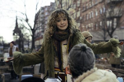 Twila (Haley Lu Richardson) talks to a child on Ponies Episode 102.