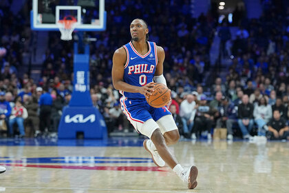 Tyrese Maxey of the Philadelphia 76ers shoots the ball against the Milwaukee Bucks.