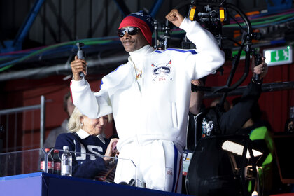 Snoop Dogg at the Milano Ice Skating Arena during the 2026 Milan Cortina Olympics