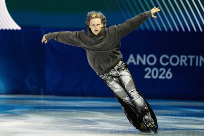 Ilia Malinin skating on the ice during the Milano Cortina 2026 Winter Olympics.
