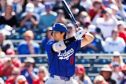 Shohei Ohtani of the Los Angeles Dodgers at bat during the spring training game against the Los Angeles Angels.