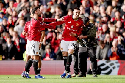 Benjamin Sesko of Manchester United celebrates scoring his team's second goal with Bruno Fernandes during the Premier League match between Manchester United and Crystal Palace.