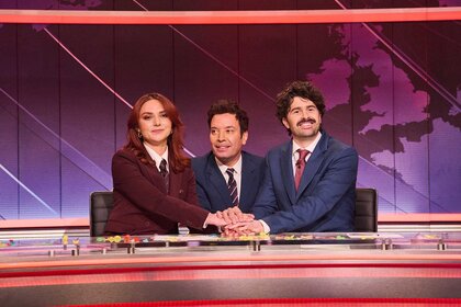 Ania Magliano, Jimmy Fallon, and Paddy Young hold hands during Saturday Night Live UK Show 5.