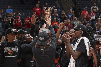 The Indiana Fever celebrate after winning the 2025 WNBA Commissioner's Cup.
