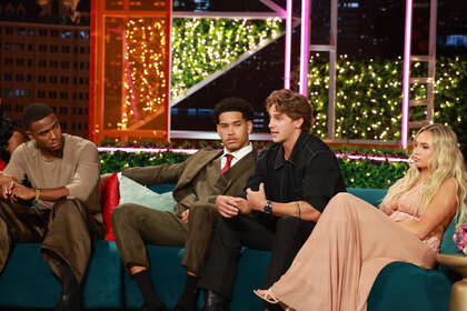 Kuman Dameon “KC” Chandler, Corbin Mims, Caleb McDaniel, and Jenn Terry seated at the Love Island USA Season 8 Reunion.