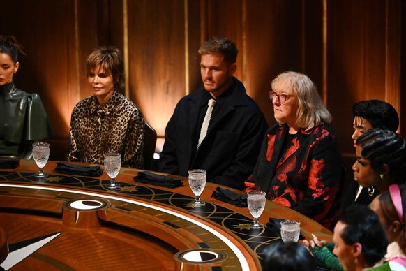 Lisa Rinna, Colton Underwood, Donna Kelce, Eric Nam, and Monét X Change around the round table on The Traitors Season 4 Episode 1.&nbsp;