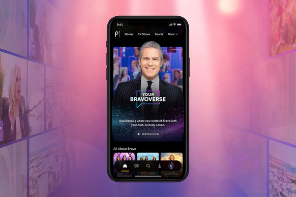 A smartphone showing Peacock's homepage with AI Andy Cohen.