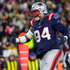 New England Patriots defensive tackle Cory Durden celebrates a tackle in the second quarter on the field.