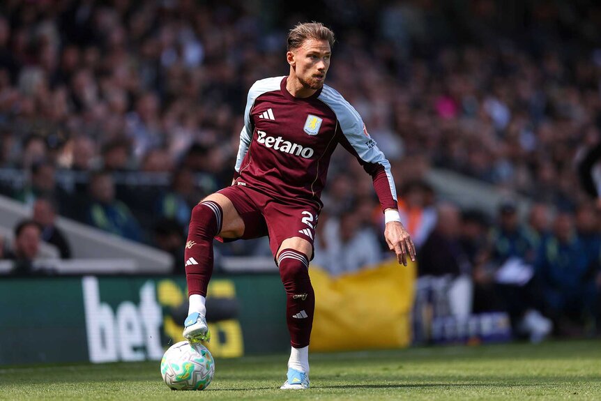 Matty Cash of Aston Villa controls the ball during the Premier League match between Fulham and Aston Villa.