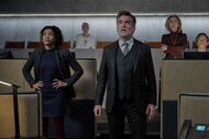 Parker, Ellie, and Peter Moira standing and looking up in The Copenhagen Test Season 1 Episode 5.