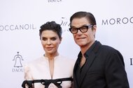 Lisa Rinna and Harry Hamlin smile together.