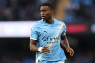 Marc Guehi of Manchester City looks off during the Premier League match between Manchester City and Wolverhampton Wanderers.