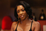Porsha Williams smiling in The Real Housewives of Atlanta Season 17.