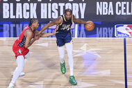 Kevin Durant with the ball on the court at the 2026 NBA All-Star Game.
