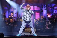 Jack Black singing on stage during his monologue on Saturday Night Live Season 50 Episode 16.