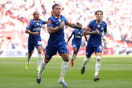 Enzo Fernandez of Chelsea celebrates scoring his team's first goal with teammates during the Emirates FA Cup Semi Final match.