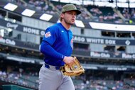 Nico Hoerner of the Chicago Cubs takes the field before a game against the Chicago White Sox.