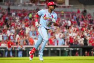 Jordan Walker of the St. Louis Cardinals rounds the bases after hitting a three-run home run in the sixth inning during the game between the St. Louis Cardinals and the Cincinnati Reds.