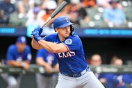 Wyatt Langford of the Texas Rangers bats during the third inning against the Baltimore Orioles.
