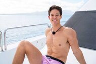 Carl Schmidt sitting on a boat on Love Island USA Season 8 Episode 18.