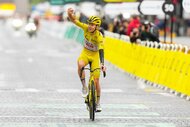 Tadej POGACAR of Slovenia celebrates winning his fourth Tour de France during the stage 21 of the Tour de France 2025.