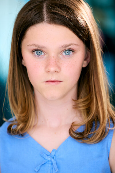 Gwendolyn Sundstrom wears a blue shirt.