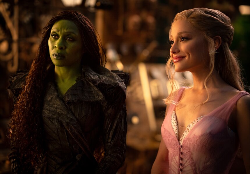 Elphaba (Cynthia Erivo) and Glinda (Ariana Grande) stand next to each other in Wicked For Good (2025).