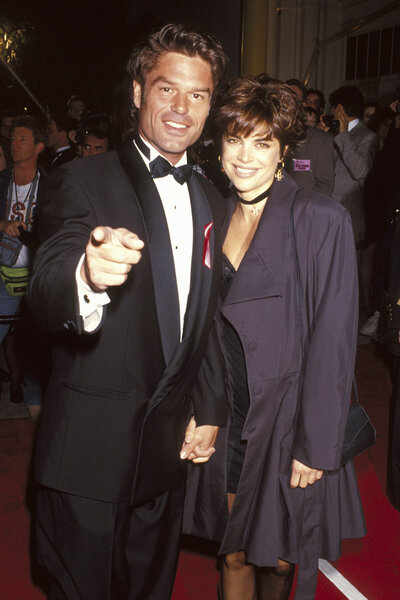 Harry Hamlin and Lisa Rinna posing and smiling together.