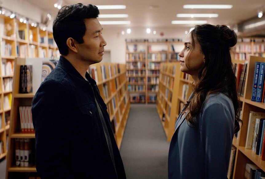 Alexander and Michelle talking in a book store in The Copenhagen Test Season 1 Episode 1.&nbsp;