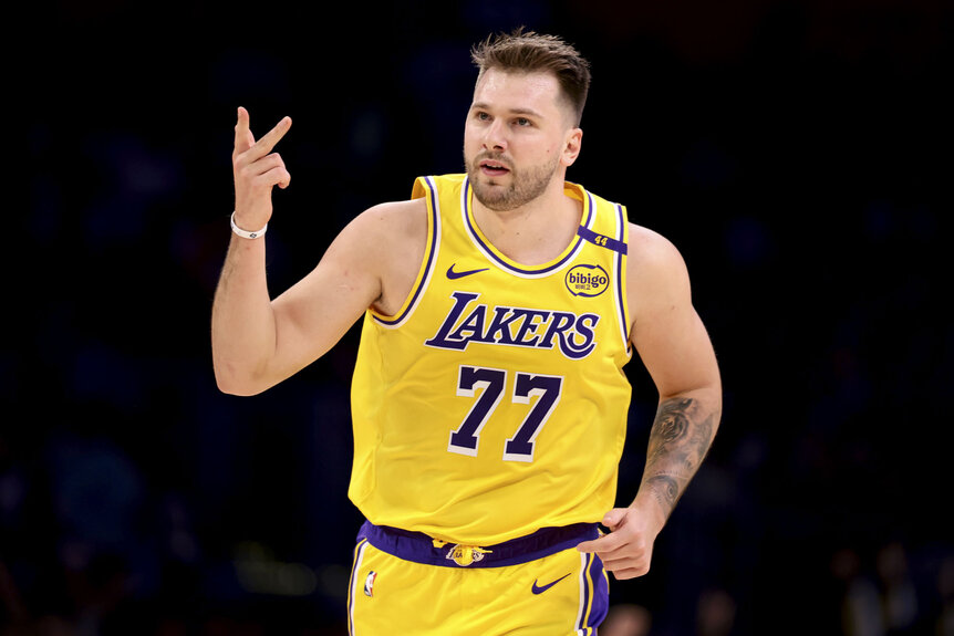Luka Doncic, #77 of the Los Angeles Lakers, celebrating during a game against the Denver Nuggets.