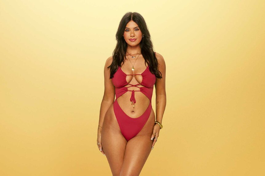 Belle in a red bathing suit for Love Island: All Stars Season 3.