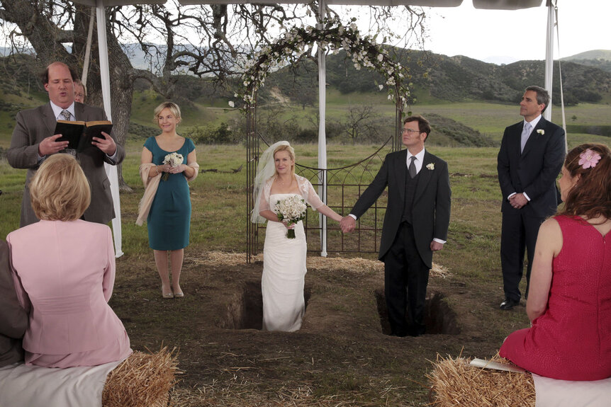The cast of in The Office Season 9 during Rachel (Rachael Harris) and Dwight Schrute's (Rainn Wilson) wedding.