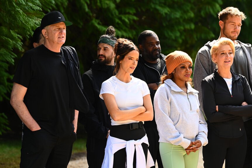 The cast stands outside on The Traitors Episode 405.&nbsp;