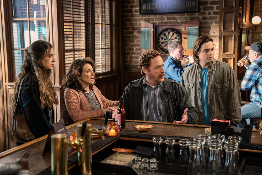 Blaire (Giorgia Whigham), Susan (Alanna Ubach), as Matty (Scott Grimes), John (Max Burkholder) in Ted Season 2.