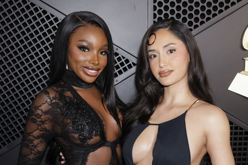 JaNa Craig and Leah Kateb smile together on the The 68th Annual Grammy Awards red carpet.