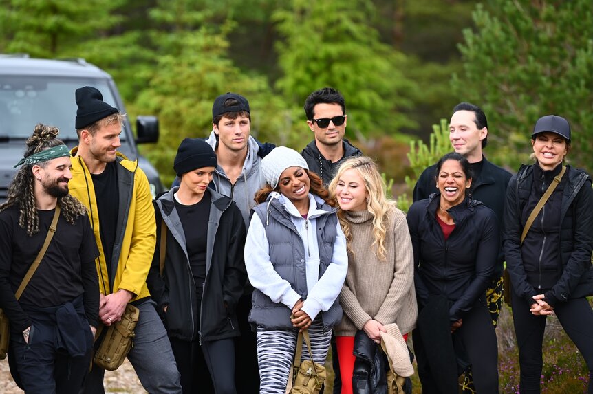 The cast stands outside on The Traitors Episode 407.