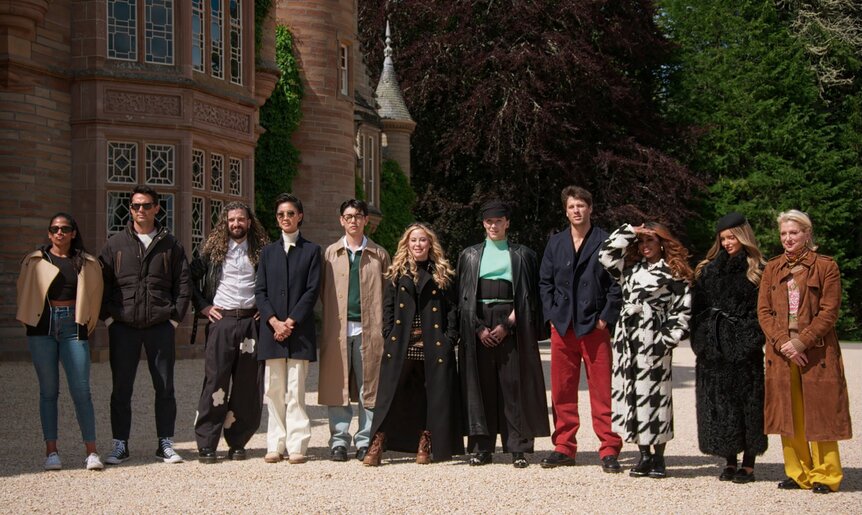 The cast of The Traitors stand outside the castle on Episode 408.